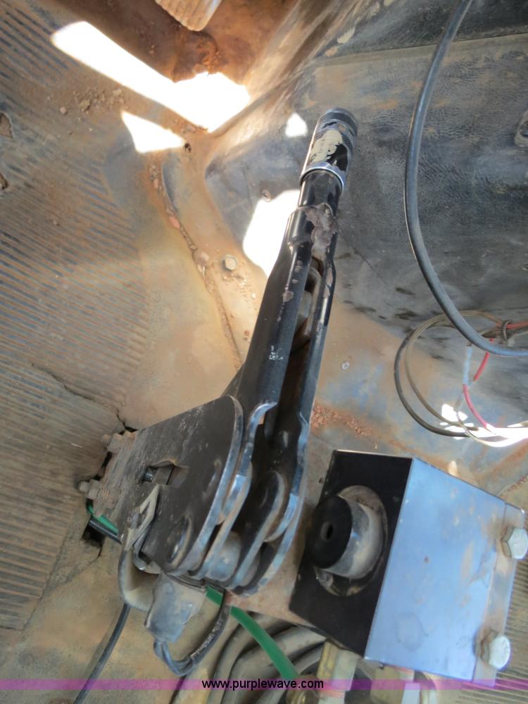 image for item B2457 1997 International 4700 winch truck