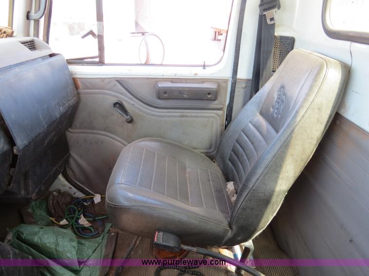 image for item B2457 1997 International 4700 winch truck