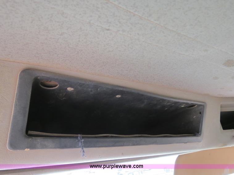 image for item B2457 1997 International 4700 winch truck