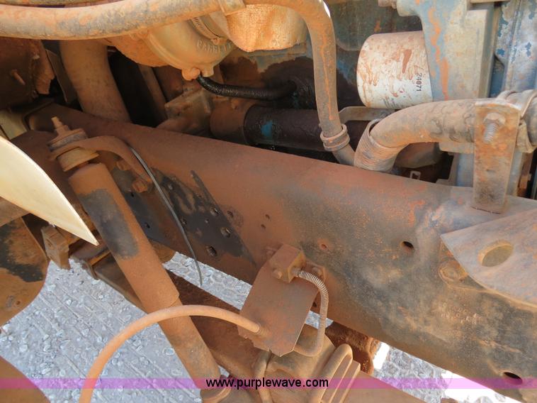 image for item B2457 1997 International 4700 winch truck