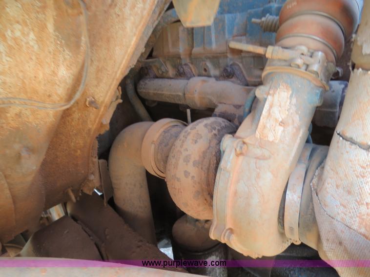 image for item B2457 1997 International 4700 winch truck