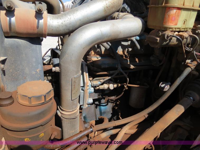 image for item B2457 1997 International 4700 winch truck