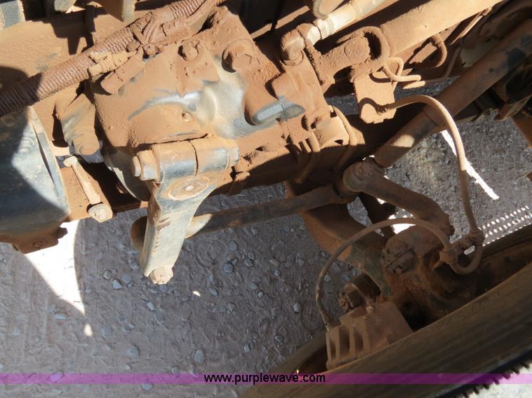 image for item B2457 1997 International 4700 winch truck