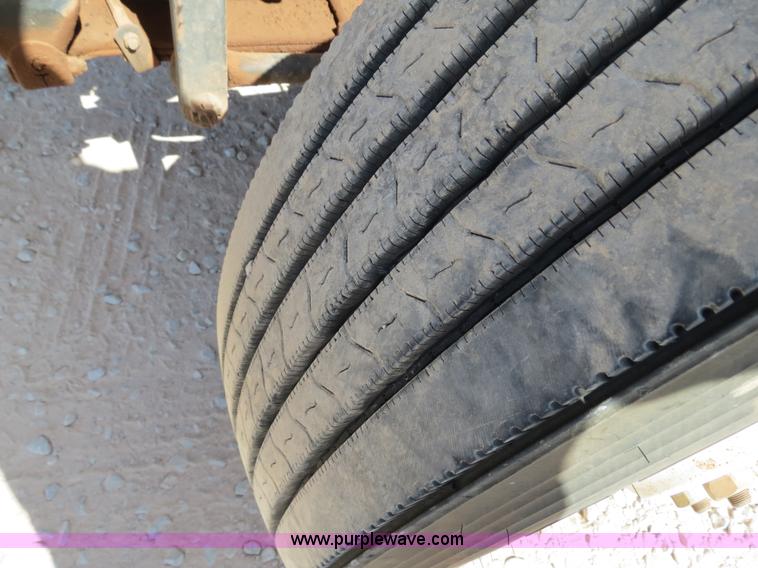 image for item B2457 1997 International 4700 winch truck