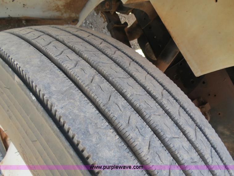 image for item B2457 1997 International 4700 winch truck