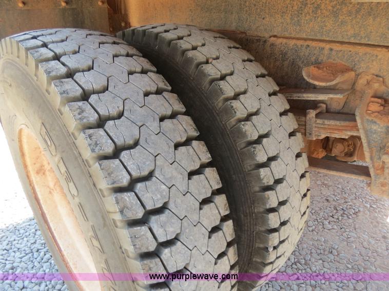 image for item B2457 1997 International 4700 winch truck