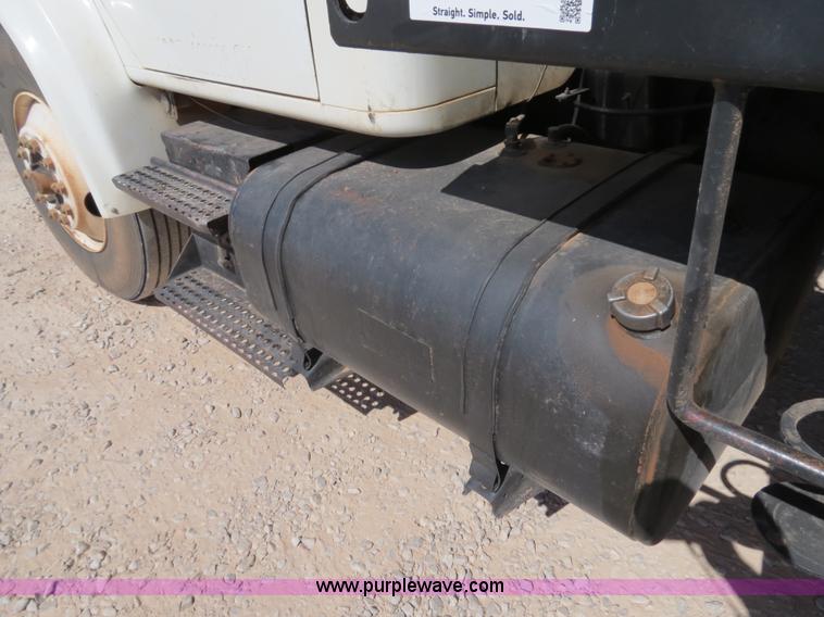 image for item B2457 1997 International 4700 winch truck