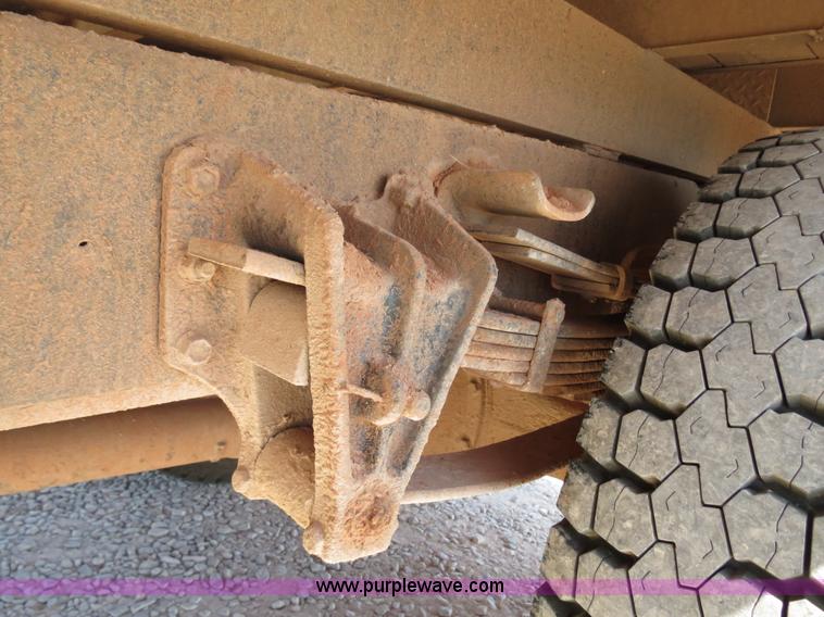 image for item B2457 1997 International 4700 winch truck