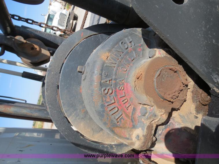 image for item B2457 1997 International 4700 winch truck