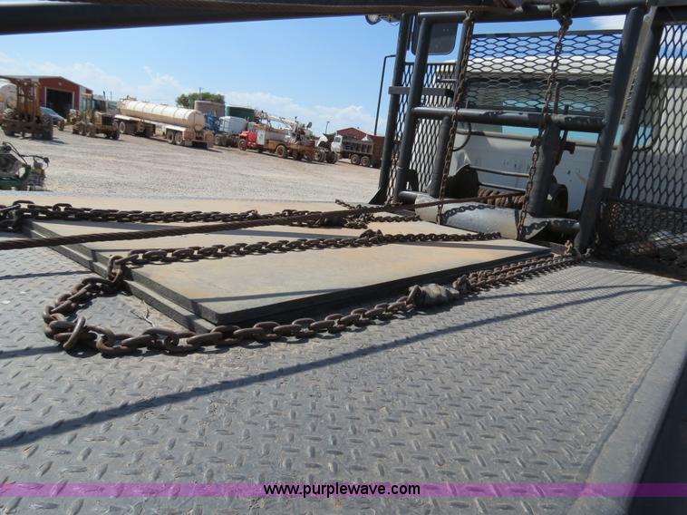 image for item B2457 1997 International 4700 winch truck