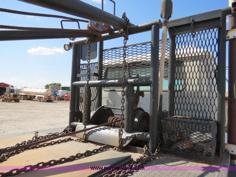 image for item B2457 1997 International 4700 winch truck