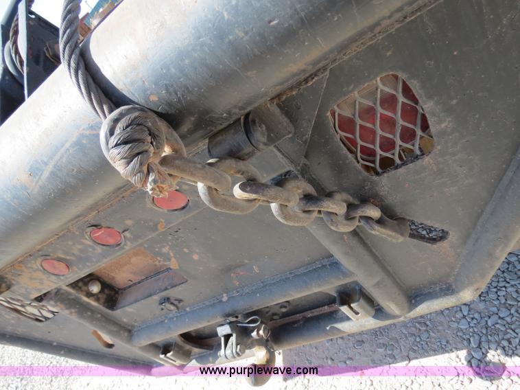 image for item B2457 1997 International 4700 winch truck