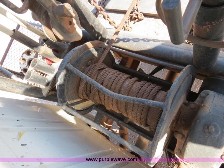 image for item B2457 1997 International 4700 winch truck