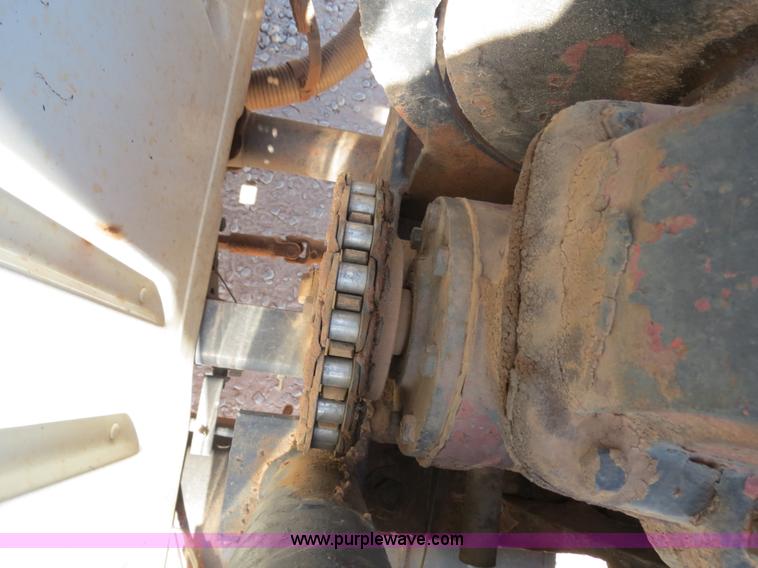 image for item B2457 1997 International 4700 winch truck