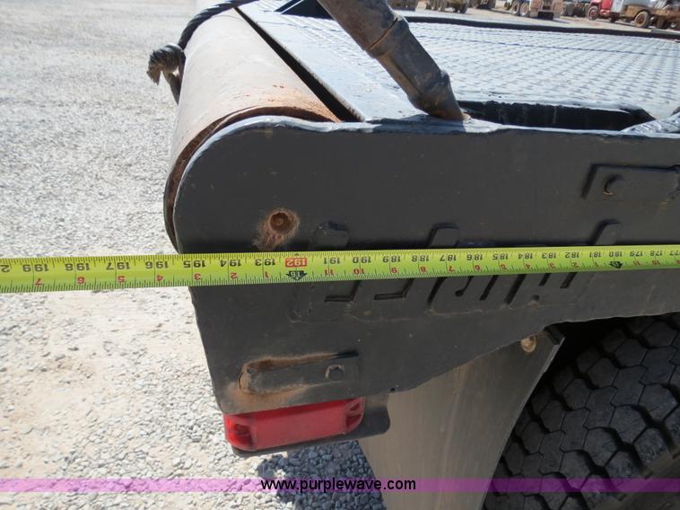 image for item B2457 1997 International 4700 winch truck