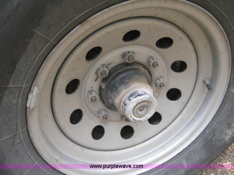 image for item B8032 2003 Load-Trail tandem axle flatbed trailer