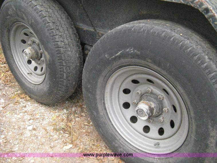 image for item B8032 2003 Load-Trail tandem axle flatbed trailer