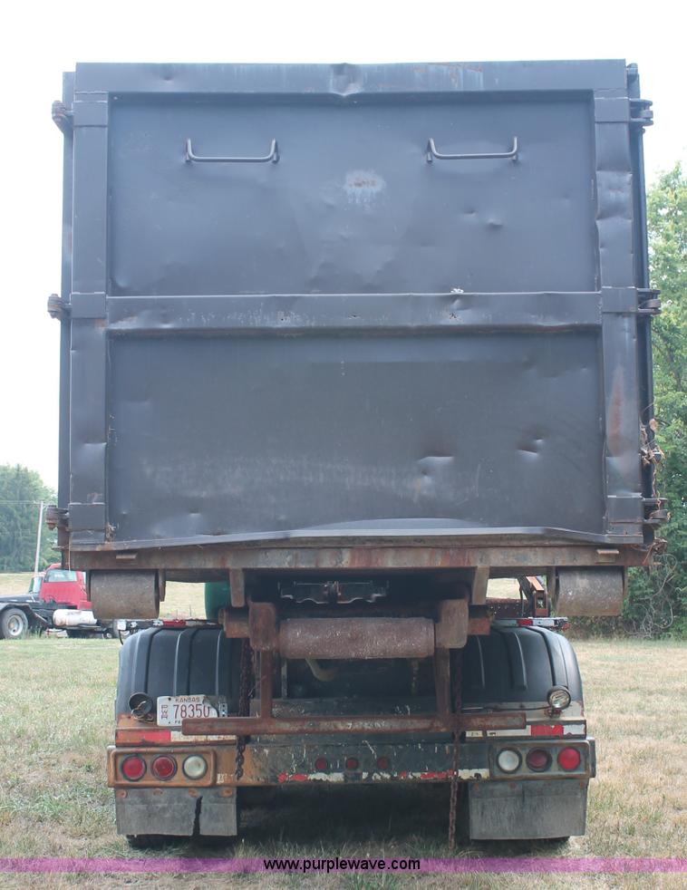 image for item C2737 1985 Mack DM685S roll off truck