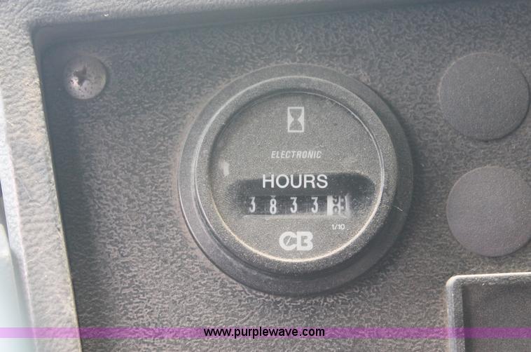 image for item C2737 1985 Mack DM685S roll off truck