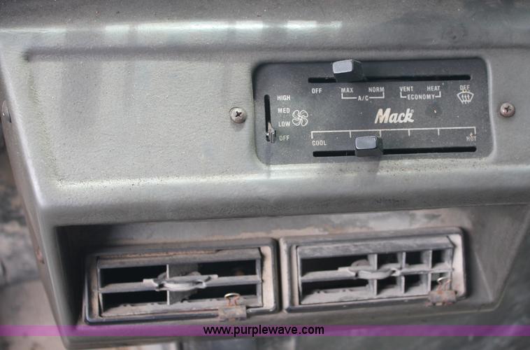image for item C2737 1985 Mack DM685S roll off truck