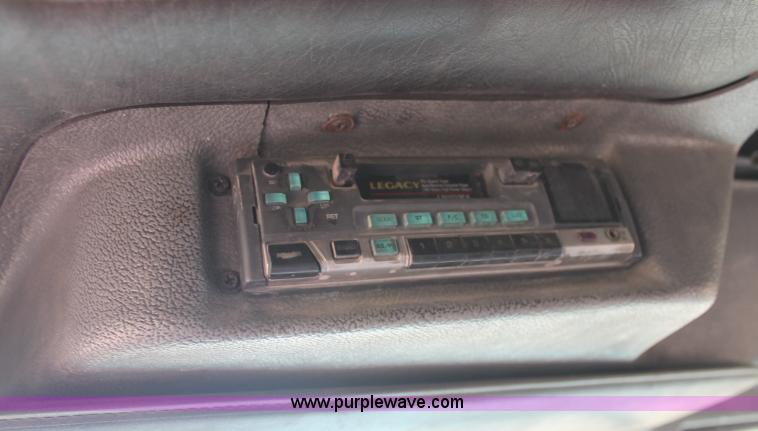 image for item C2737 1985 Mack DM685S roll off truck