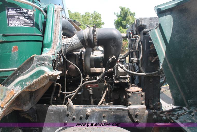 image for item C2737 1985 Mack DM685S roll off truck