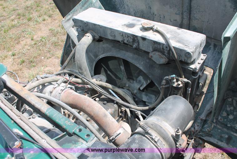 image for item C2737 1985 Mack DM685S roll off truck