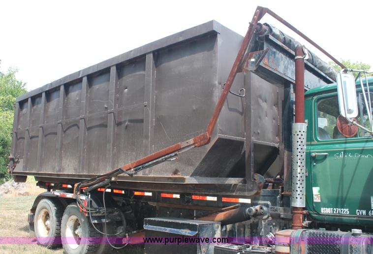 image for item C2737 1985 Mack DM685S roll off truck