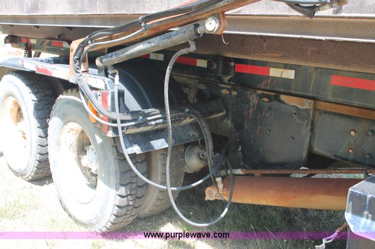 image for item C2737 1985 Mack DM685S roll off truck