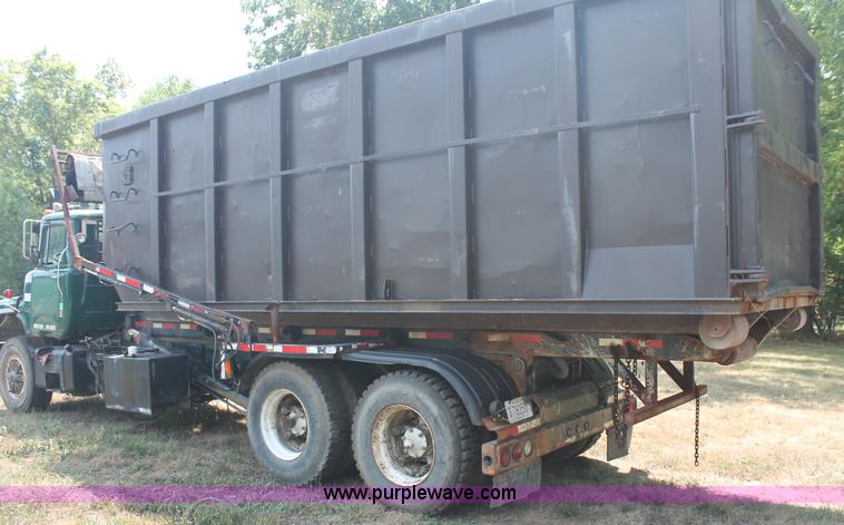 image for item C2737 1985 Mack DM685S roll off truck