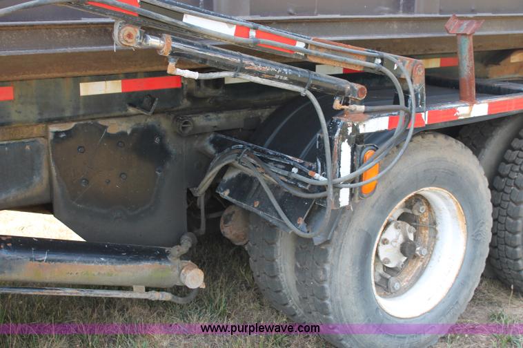 image for item C2737 1985 Mack DM685S roll off truck