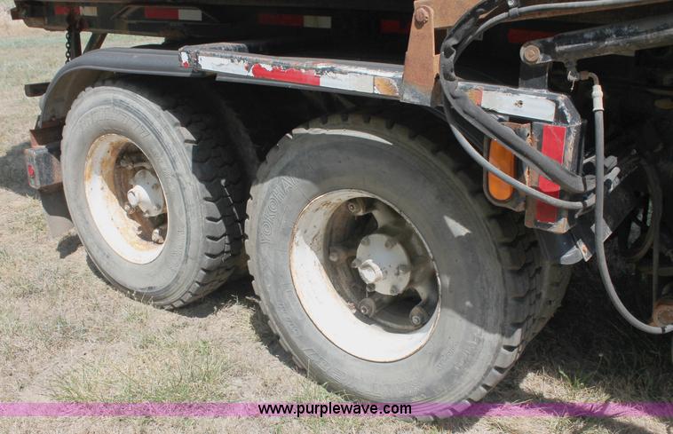 image for item C2737 1985 Mack DM685S roll off truck