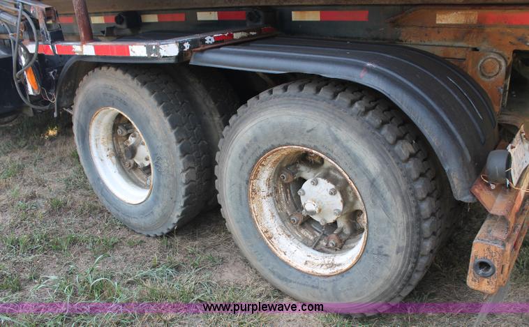 image for item C2737 1985 Mack DM685S roll off truck