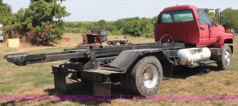 image for item C2738 1996 GMC TopKick roll off truck