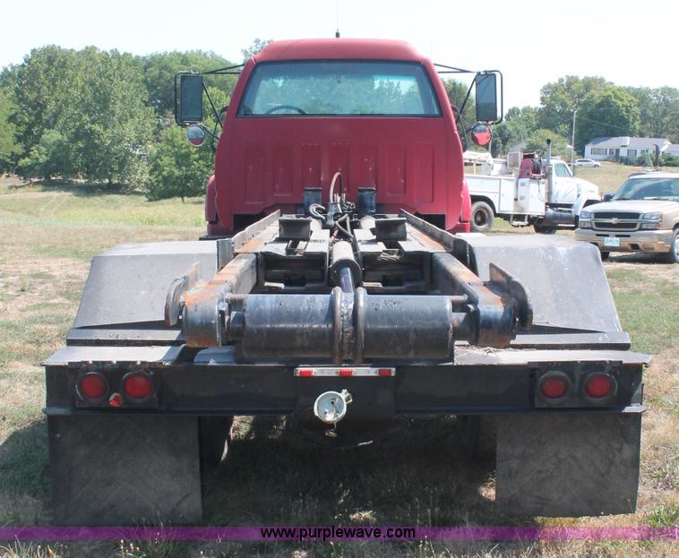 image for item C2738 1996 GMC TopKick roll off truck
