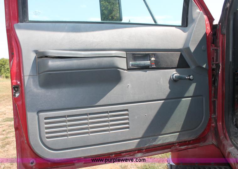 image for item C2738 1996 GMC TopKick roll off truck