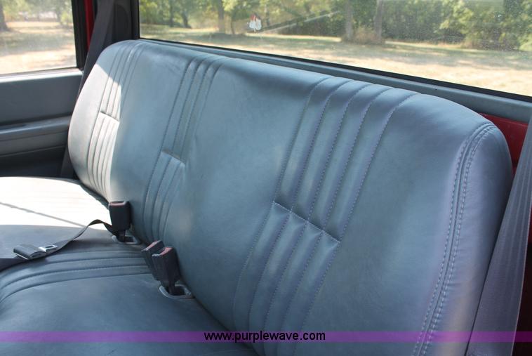 image for item C2738 1996 GMC TopKick roll off truck