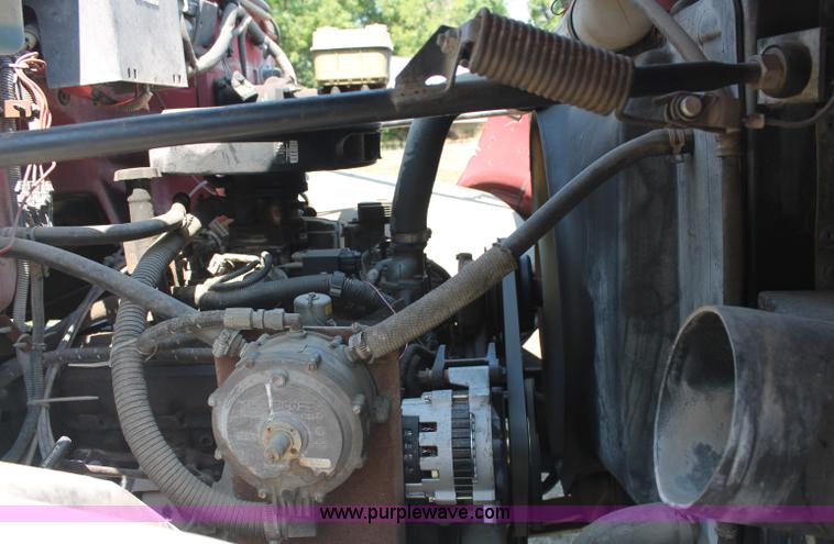 image for item C2738 1996 GMC TopKick roll off truck