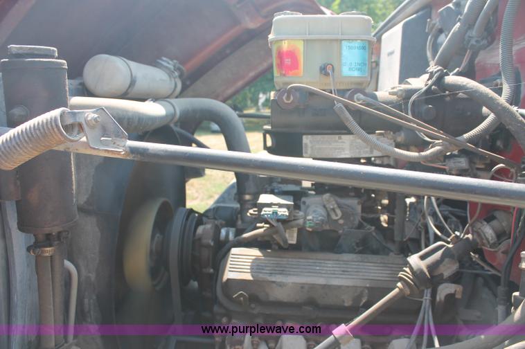 image for item C2738 1996 GMC TopKick roll off truck