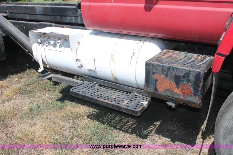 image for item C2738 1996 GMC TopKick roll off truck