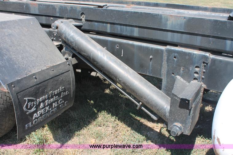 image for item C2738 1996 GMC TopKick roll off truck