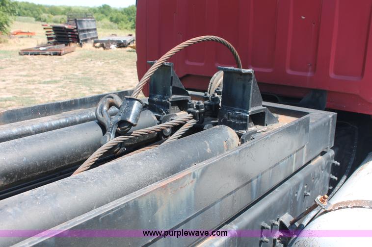 image for item C2738 1996 GMC TopKick roll off truck