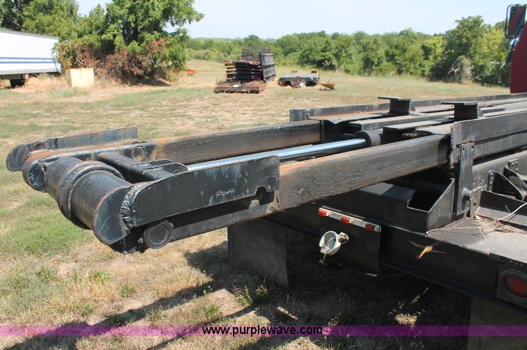 image for item C2738 1996 GMC TopKick roll off truck