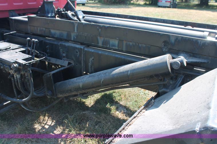 image for item C2738 1996 GMC TopKick roll off truck