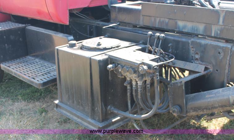 image for item C2738 1996 GMC TopKick roll off truck