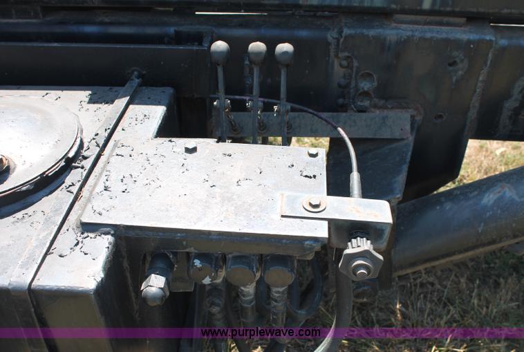 image for item C2738 1996 GMC TopKick roll off truck