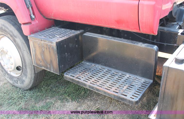 image for item C2738 1996 GMC TopKick roll off truck