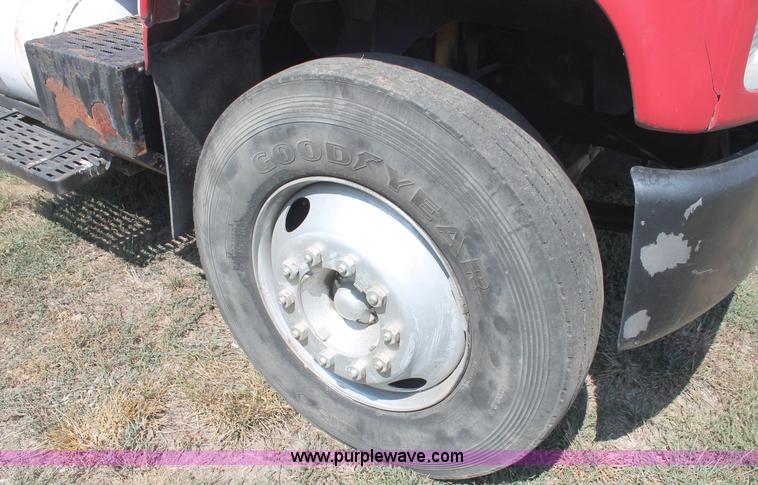 image for item C2738 1996 GMC TopKick roll off truck