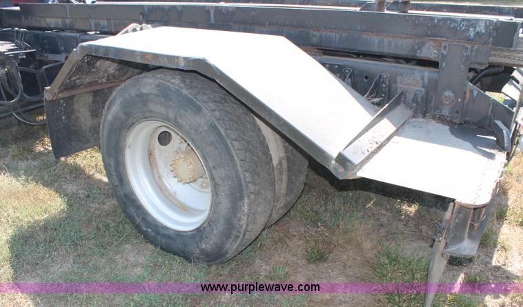 image for item C2738 1996 GMC TopKick roll off truck
