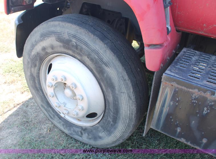 image for item C2738 1996 GMC TopKick roll off truck